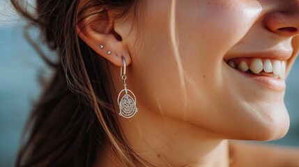 Earrings on smiling woman