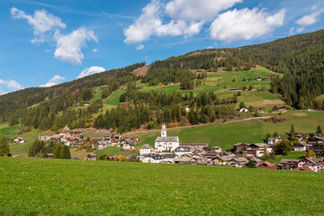 Scenic view of remote mountain village of Sexten in South Tyrol, Italy, Europe. Hiking trail on...