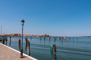Wooden briccola in Sottomarina, Veneto, Northern Italy, Europe. Panoramic view on idyllic harbor of...