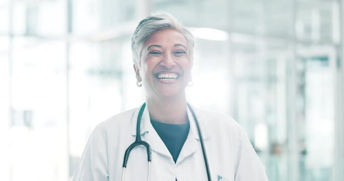 Doctor, happy and hospital in portrait for healthcare, surgery or checkup. Female surgeon, smile and confident in private practice for life insurance, consultation or medical advice at clinic