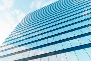 Fototapeta na wymiar High-rise modern building made of glass against the sky.
