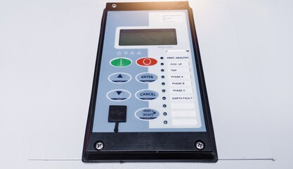 Close up the Over Current Rellay on control cubicle panel.