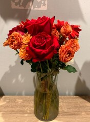 beautiful roses, sun flower and flowers in a vase