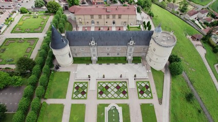 drone shot tilting down of the Chateau de Boutheon in Andrezieux Boutheon, Loire departement, France