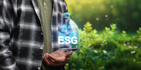 Business owner thinking about sustainable development of the organization ESG, Environment, Social,...