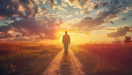 Möbelaufkleber Man walking on a deserted road at sunset. Search for self concept. © volga