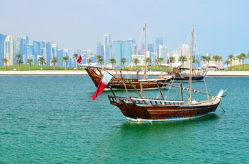 Fototapeta premium View of Doha waterfront with dhow boats and modern architecture