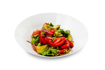 Fresh vegetable salad in a white plate. Isolated.