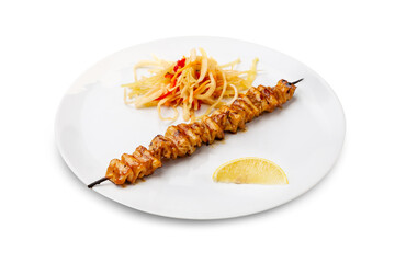 Grilled squid kebab in a white plate. Isolated.