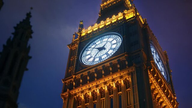 Big Ben's iconic clock tower illuminated by the night sky in London