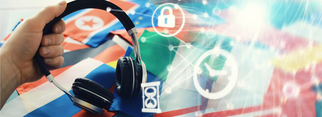 Background concept polyglot. Headphones and flag. The study of foreign subjects. Audiobooks in a...
