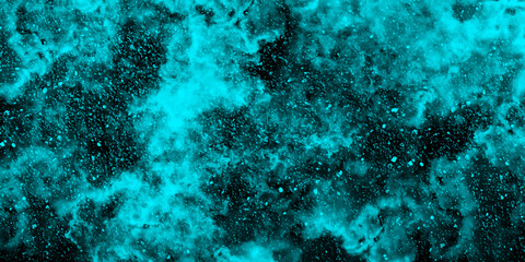 Fototapeta na wymiar Abstract dynamic particles with soft blue clouds on dark background. Defocused Lights and Dust Particles. Watercolor wash aqua painted texture grungy design