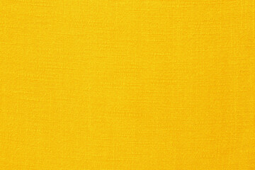 Yellow linen fabric cloth texture for background, natural textile pattern.