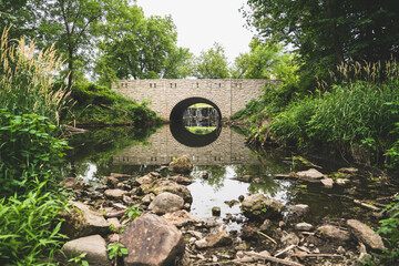 Old Stone Bridge And Waterfall