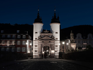 Fototapeta na wymiar Heidelberg Germany old bridge gate at blue hour