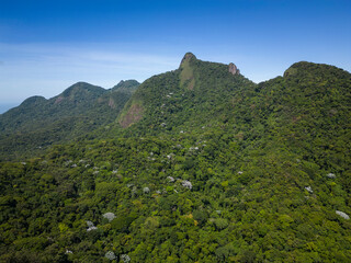 Beautiful aerial view to green rocky rainforest mountains in Tijuca