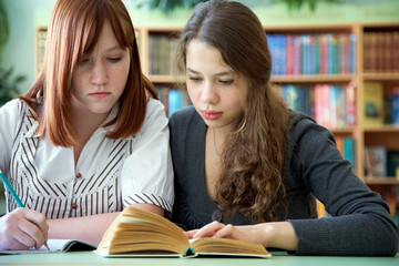 student girlfriends at the library