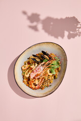 Elevated Seafood Fried Rice with Scenic Shadow Art, Ideal for Modern Asian Cuisine