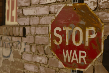 Weathered old "Stop war" sign