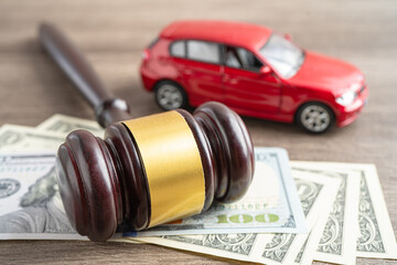 Hammer gavel judge and US dollar banknote money with car vehicle accident, insurance coverage claim...