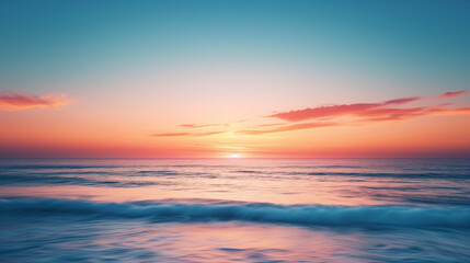 Fototapeta premium Panoramic view of the ocean as the sunset paints