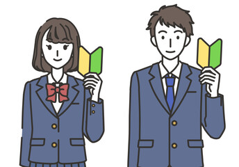 初心者マークを持つ男子と女子