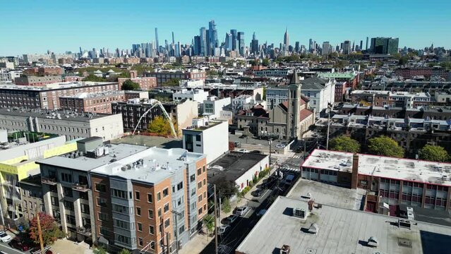 Experience Hoboken's charm with a captivating drone pull-out shot revealing the breathtaking New York City view.