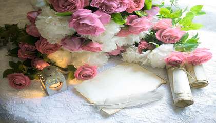 Paper with quill and flowers