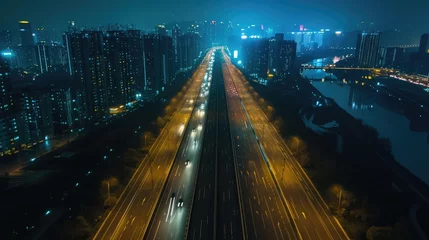 Zelfklevend Fotobehang Straight asphalt highway passing through the city above in Hangzhou at night © buraratn