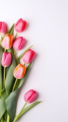 Obraz premium Beautiful tulips for Mother's Day on a light background, top view