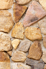 Background of stone wall texture. Closeup of stone wall texture.