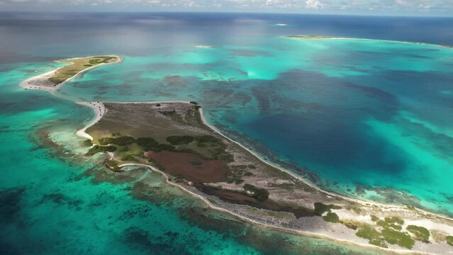 Los roques archipelago with clear turquoise waters and scattered islands, aerial view