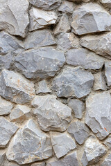 Background of stone wall texture close up. Natural stone wall background.
