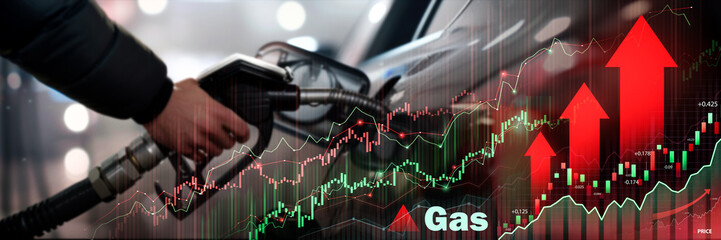 Hand adjusting gas stove with overlaid financial graphs, symbolizing gas market trends