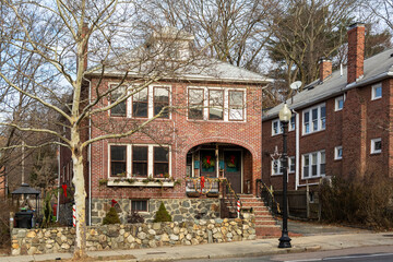 Old red brick multi family home in Brighton, MA, USA