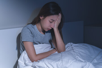 Sad worried and stressed, depressed asian young woman, girl suffering in bed from insomnia problem,...