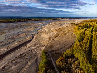 aerial panorama of waimakariri river near christchurch, north canterbury, new zealand; sunset over beautiful river