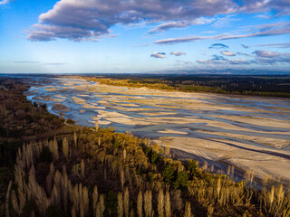 aerial panorama of waimakariri river near christchurch, north canterbury, new zealand; sunset over beautiful river