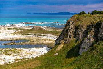 panorama of kaikoura peninsula in north canterbury, new zealand; famous rocky peninsula with cliffs and fur seal colony