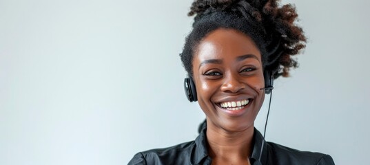 a black woman smiling wearing headphone as a customer service, against white background