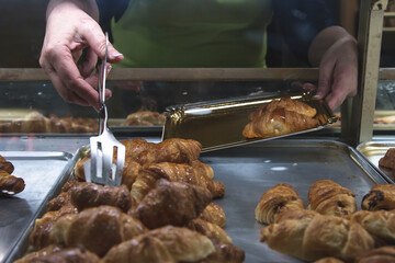 croissants on a tray in a bakery