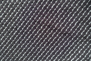 Background - black and white jersey fabric with geometric pattern
