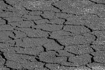 Land with dry and soil drought cracked landscape, Global warming concept. Black and white photo.