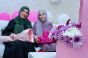 love and respect between mother and daughter with beautiful presents in living room with cheerful faces