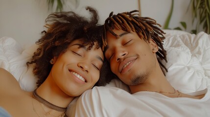 Serene multiracial couple in 20s, peacefully sleeping on cozy white bed with soft blanket