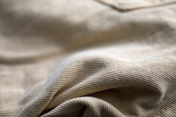 Denim fabric close-up, distinct texture. Abstract background