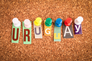 URUGUAY. Letters pinned to a cork notice board