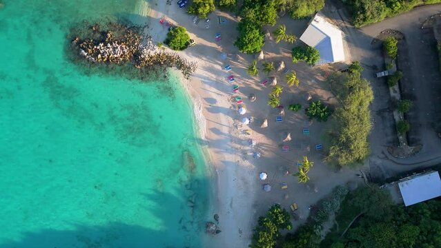 High angle top down overview of Daaibooi beach estalishes tropical Caribbean paradise