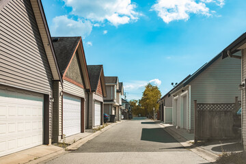 Row of garage doors at parking area for townhouses