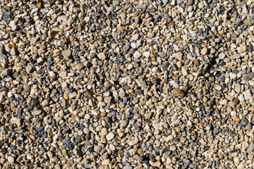Pebble stone background, closeup top view of pebble stones, stone for garden walking path